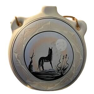 VINTAGE NATIVE AMERICAN WHITE JUG FEATURING HOWLING WOLF LEATHER HANDLE NESBITT